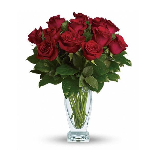 Bouquet of red roses in a clear glass vase