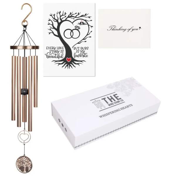 Copper wind chime with heart accents and a sympathy card