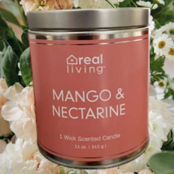 Pink mango and nectarine scented candle in a metal tin
