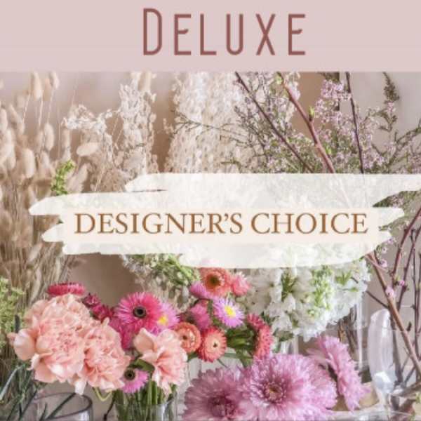 Designer’s choice deluxe floral arrangement with pink and white blooms