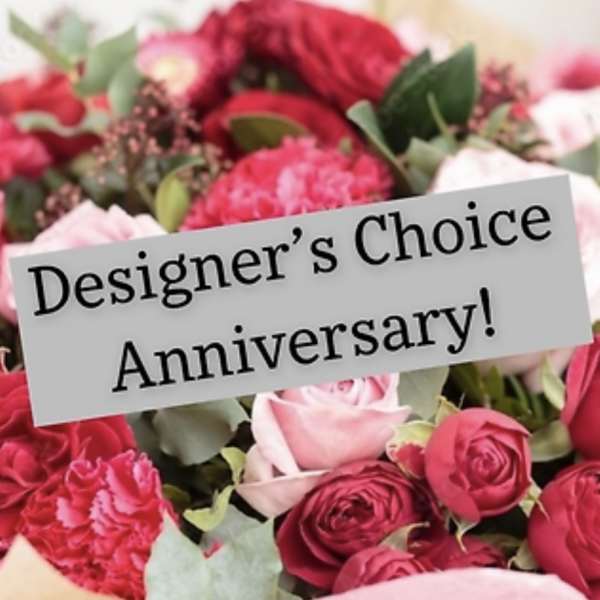 Pink and red rose bouquet with an anniversary sign