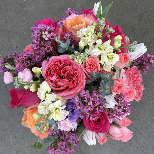 Colorful bouquet of pink, coral, and purple flowers