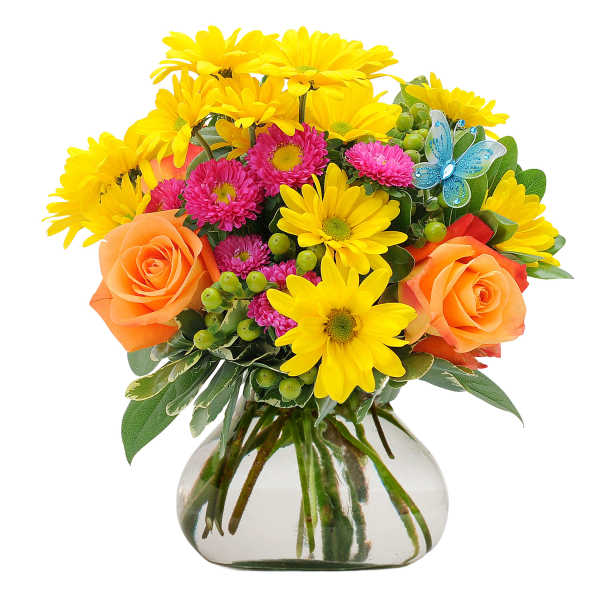 Bouquet of yellow daisies, pink flowers, and orange roses in a glass vase