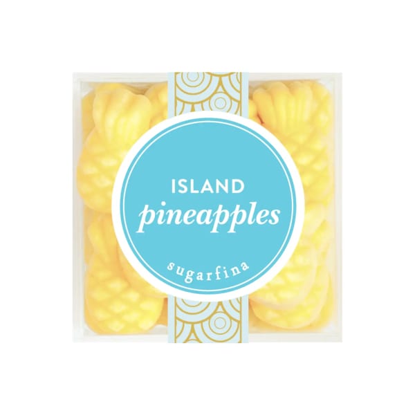 Box of yellow pineapple-shaped candies with a blue label