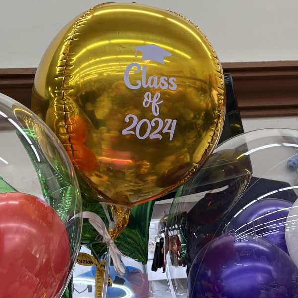 Gold graduation balloon with "Class of 2024" text