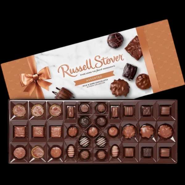 Box of assorted chocolates with a ribboned lid