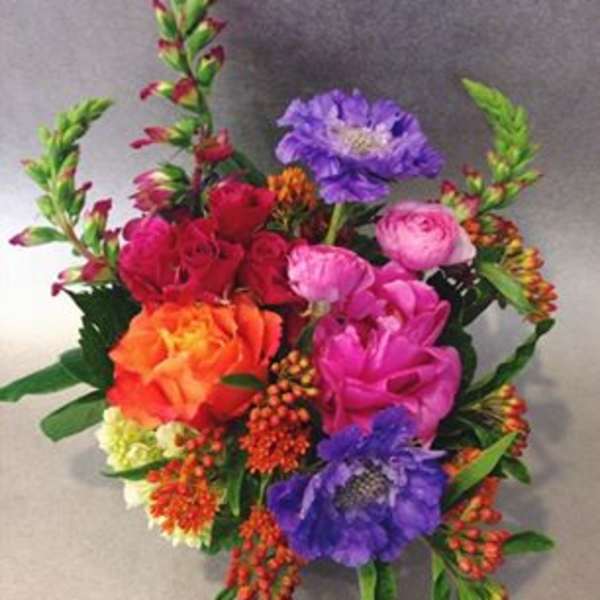 Colorful bouquet with pink, orange, purple, and red flowers