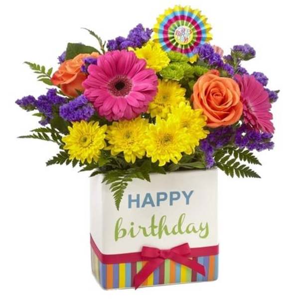 Colorful birthday flower arrangement in a decorated gift box