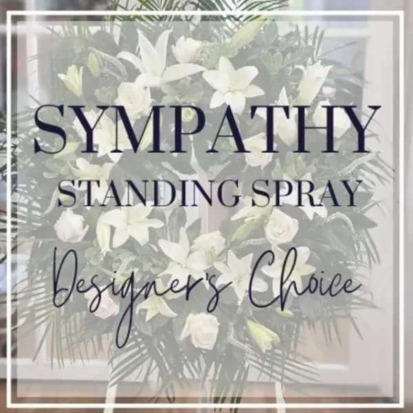 White sympathy standing spray with lilies and roses