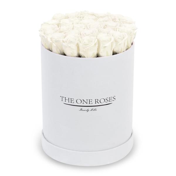White roses arranged in a round white box