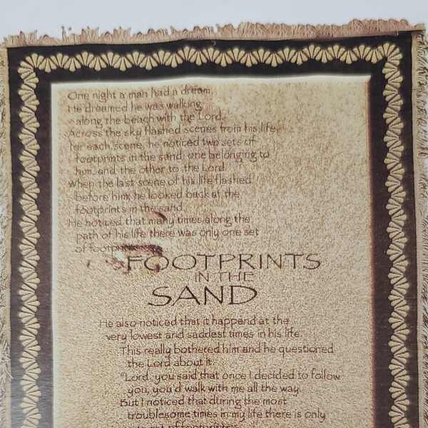 Framed wall hanging with the poem "Footprints in the Sand"