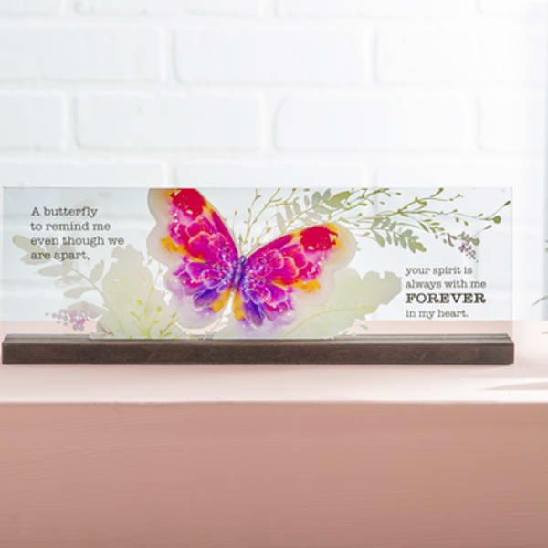Butterfly memorial plaque with a colorful butterfly and sympathy text