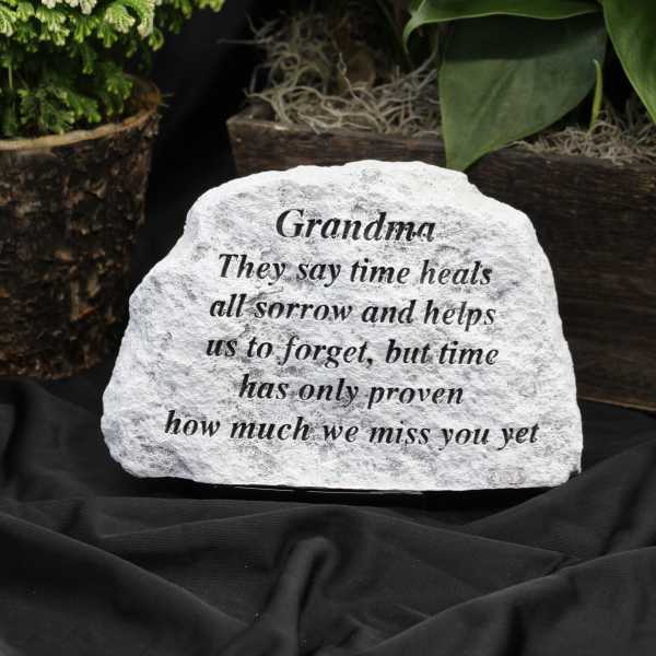 Engraved memorial stone with the word Grandma and a sympathy message