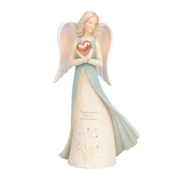Angel figurine holding a pink heart