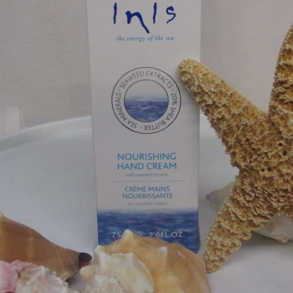 Box of nourishing hand cream with seashells