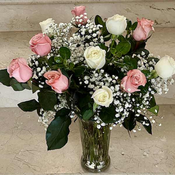 12 Roses arranged in a vase (6 Light Pink and 6 White Roses)