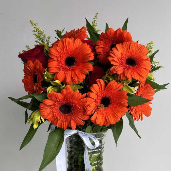 Gerberas In Vase
