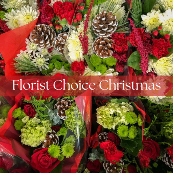 Christmas bouquets with red and white flowers, pinecones, and red wrap