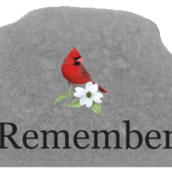 Gray memorial stone with a red cardinal and white flower above the word Remember