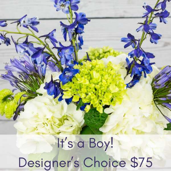 Blue and white floral arrangement with lime-green blooms and an "It's a Boy!" sign