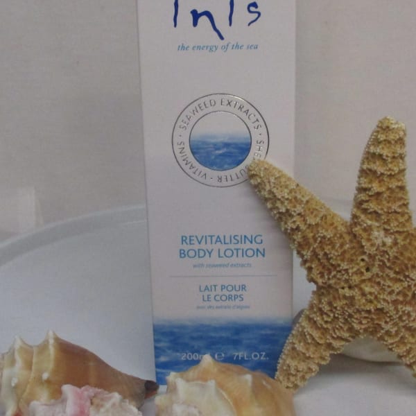 Body lotion box with seashells and a starfish