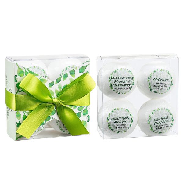 Set of four wrapped bath bombs in clear boxes with a green ribbon