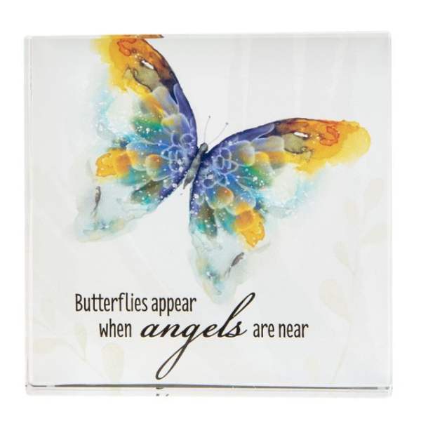 Decorative plaque with a colorful butterfly and memorial text