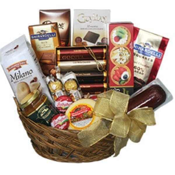 Gift basket with assorted chocolates and candies in a wicker basket