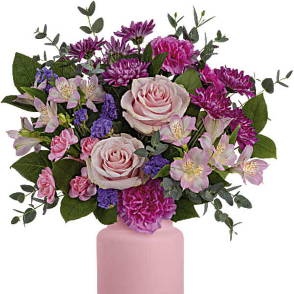 Pink and purple mixed bouquet in a pink vase