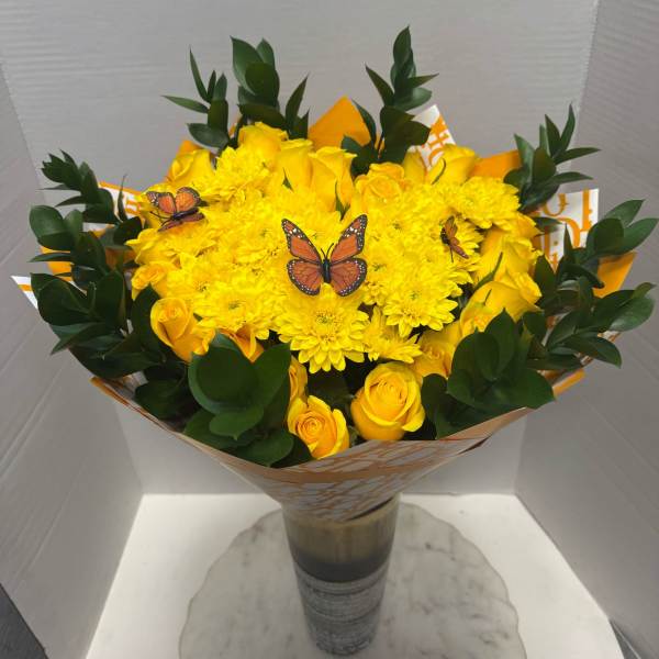 Yellow rose and chrysanthemum bouquet with butterfly picks