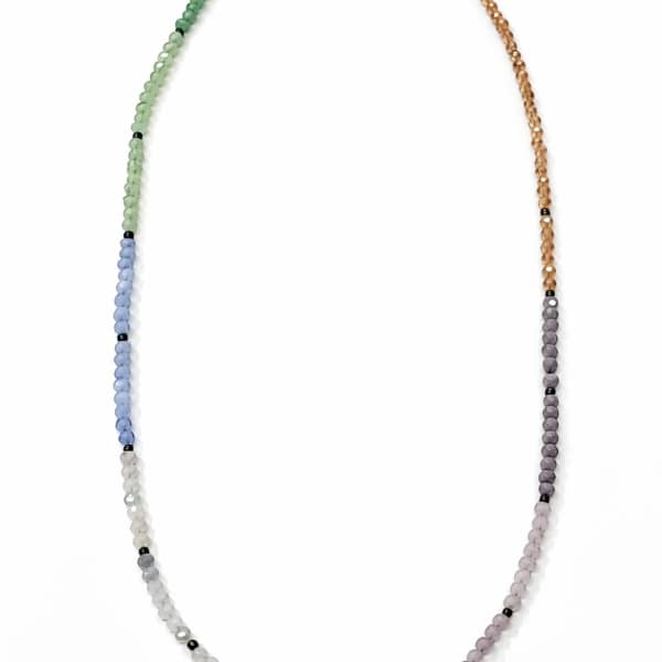 Beaded multicolor necklace on a white background