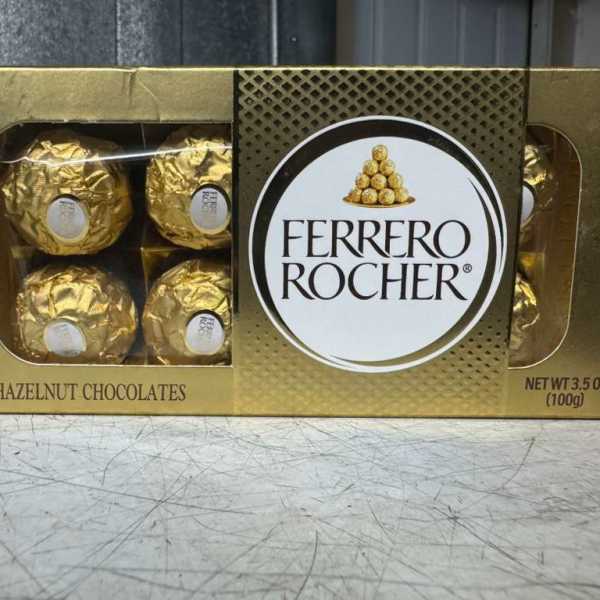 Box of Ferrero Rocher chocolates in gold wrappers