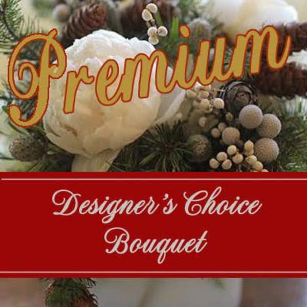 White peony-style flower with pinecones and berries overlaid with Premium Designer's Choice Bouquet text.