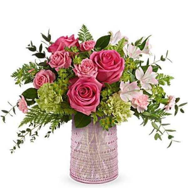Pink roses and white lilies in a pink textured vase