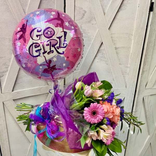Pink and purple bouquet with a "Go Girl!" balloon