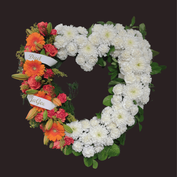 Heart-shaped floral wreath with white and orange flowers and name ribbons