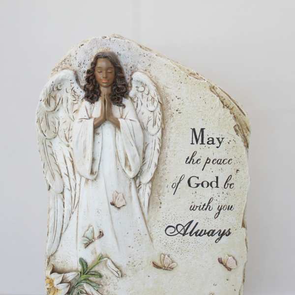 Decorative angel figurine with a peace message