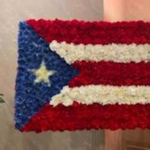 Floral arrangement shaped like the Puerto Rican flag