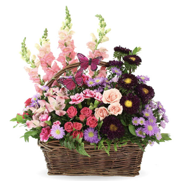Mixed flower basket with pink, purple, and peach blooms and butterfly accents