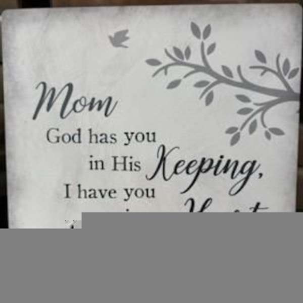 Decorative sign with a condolence message for Mom