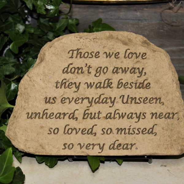 Engraved memorial stone with a sympathy quote
