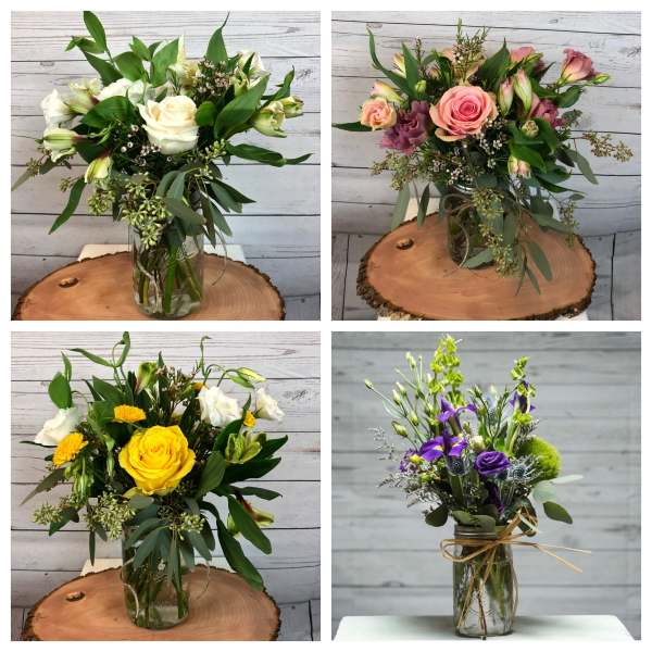 Four mixed flower bouquets in glass jars with pink, white, yellow, and purple blooms.