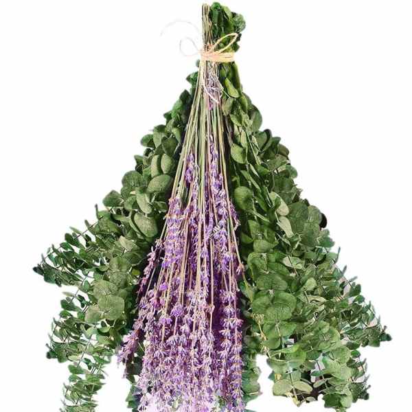 Bundle of eucalyptus and dried purple flowers tied together