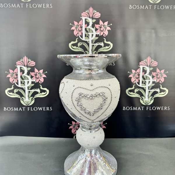 Decorative silver mosaic pedestal vase with a heart design
