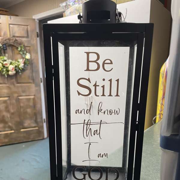 Framed sign with the words "Be Still and know that I am God"