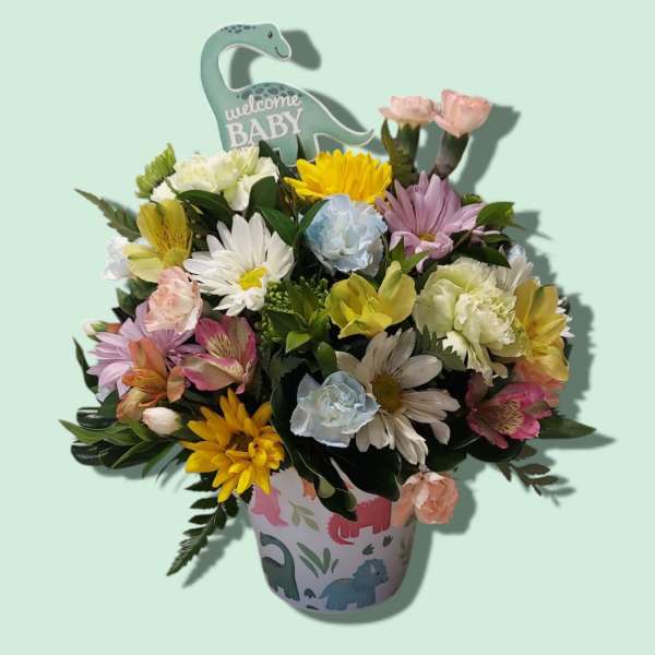 Mixed bouquet in a baby-themed pot with a welcome baby topper