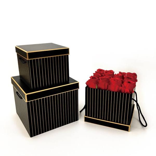 Black gift boxes with red roses in one box