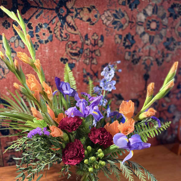 Colorful mixed bouquet in a clear glass vase