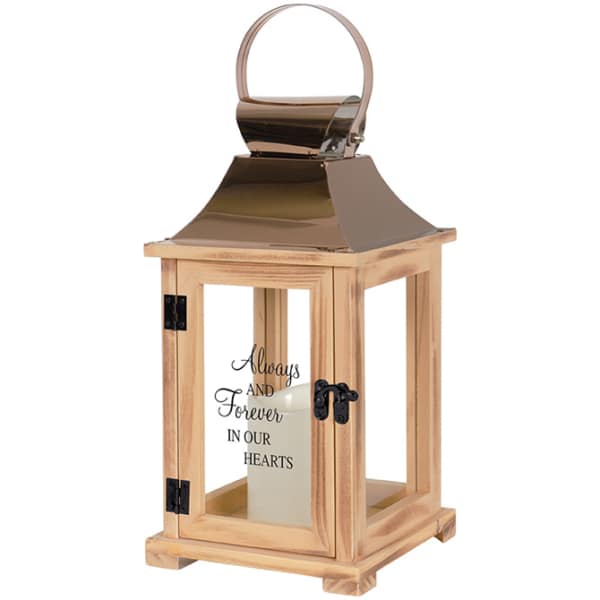 Wooden memorial lantern with a candle inside