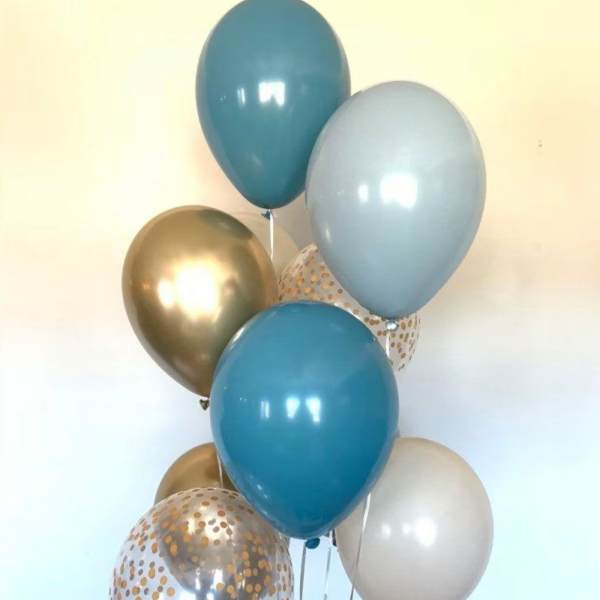Cluster of blue, gold, and white balloons with polka-dot prints